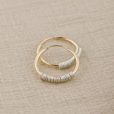 This sweet pair of Minimalist Mixed Metal Hoops is handcrafted for you with great care. Handmade with delicate 14K Gold Hoops and Sterling Silver wired charms the earring is lightweight and perfect for everyday wear. Endless hoops have a seamless and minimalist look, which makes them so beautiful. To put them in you need a gently moved curved arched post to the side to make a gap for your earlobe, then gently move the post back and put it into the end of the tube to close. 14mm hoops may be diff Minimalist Handmade Hoop Wrap Earrings, Handmade Adjustable Hoop Earrings For Everyday, Handmade Minimalist Small Hoop Wrap Earrings, Everyday Adjustable Small Hoop Wrap Earrings, Dainty Handmade Adjustable Hoop Earrings, Two Tone Jewelry, Unique Hoop Earrings, Mixed Metal Earrings, Earrings Dainty