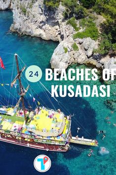 an aerial view of a boat in the ocean with text overlay that reads 24 beaches of kusadasi