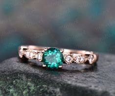 - Metal: Solid gold(10K/14K/18K white/yellow/rose gold),925 sterling silver,platinum available- Main Stone: 5mm round cut lab treated emerald- Accent Stone: natural conflict free diamonds,SI-H Clarity and Color- Can be personalized: Yes Vintage Emerald Engagement Ring, Ring Unique Design, Diamond Ring Unique, Emerald Ring Vintage, May Birthstone Rings, Green Emerald Ring, Rose Gold Diamond Ring, Unique Diamond Rings, May Birthstone