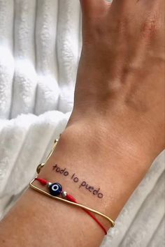 a woman's arm with a tattoo on it that says, to do pueblo