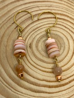 Elevate your style with our exquisite collection of fresh water natural shell earrings in a captivating pink blush tone. Elegant Nickel-free Shell Earrings, Pink Rose Quartz Earrings With Natural Stones, Handmade Pink Shell-shaped Jewelry, Handmade Pink Shell Jewelry, Bohemian Shell-shaped Pink Jewelry, Bohemian Pink Shell-shaped Jewelry, Pink Elegant Beaded Earrings For Beach, Elegant Pink Beaded Earrings For Beach, Elegant Pink Shell Jewelry