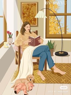 a woman sitting in a chair reading a book next to two puppies on the floor