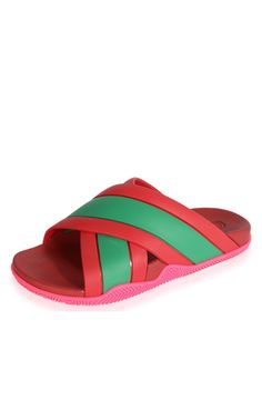 Gucci slides feature the iconic green and red Web detail, paired with a contrasting pink sole. The open toe design ensures breathability and comfort. The moulded footbed provides support for all-day comfort. Crisscross straps add a unique touch to the design. An embossed Gucci logo highlights the brand's craftsmanship. The branded insole adds a final signature touch to these luxury slides.Composition: Rubber 100%Sole: Rubber 100%Made in Italy Have Questions about us, read our FAQ Chevron Outfit, Chevron Jewelry, Gucci Slides, Red Web, Web Detail, Gucci Shop, International Clothing, Luxury Women Fashion, Shoes Flats Sandals