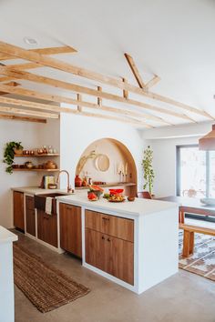 a kitchen with an oven, sink and counter top in it's center island