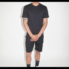 This Black Short Set Is Produced In Fresh Yarn. The T-Shirt Consists Of A 100% Combed Cotton Fabric Content. These Shorts Consists Of An 80/20 Blend In The Popular, Yet Very Limited Special Fleece. The Shorts Are Seamed Off At The Edges. These Shorts Also Consists Of Metal Clamps On The Drawstrings, Allowing Buyers To Promote Their Brands And Print Shops With The Strong Claim Of A High-Quality Garment. The Quality Speaks For Itself! Black Athleisure T-shirt For Loungewear, Basic Black Tops For Loungewear, Urban Black T-shirt For Loungewear, Basic Black T-shirt For Loungewear, Black Cotton Athleisure T-shirt, Summer Black Athleisure T-shirt, Black Casual T-shirt For Loungewear, Lakers Shorts, Adidas Soccer Shorts