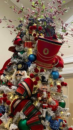 a christmas tree decorated with red and green ornaments