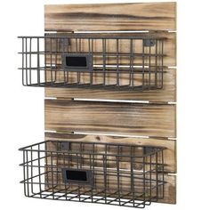 two wooden crates with wire baskets on them