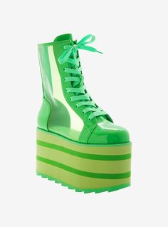 These neon green boots are made for festivals! They feature green translucent PVC panels and matching neon green laces. Comes with back zipper closure and striped platforms.Listed in women's sizes.Platform: 4'' - 4 12''Polyurethane upper; EVA soleImported Summer Green Boots With Round Toe, Green Round Toe Summer Boots, Green Synthetic Boots For Spring, Casual Green Platform Boots For Spring, Green Platform Boots With Round Toe For Spring, Green Round Toe Platform Boots For Spring, Trendy Green Lace-up Boots, Green High-top Sporty Boots, Sporty High-top Green Boots