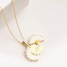 "Custom Daisy Necklace in Sterling Silver, Personalized Hidden Message Daisy Pendant is made by hand in our workshop with care. All our jewelry is the most elegant choice for the Bridesmaids, friends, your loved ones and for yourself. Custom Daisy Necklace in Sterling Silver, Personalized Hidden Message Daisy Pendant * Material: High Quality Solid 925 Sterling Silver. * Finish: Sterling Silver ∙ Gold ∙ Rose Gold. * All our jewelry is custom made by hand with care in our workshop.  HOW TO ORDER ❓ Customized Gold Flower Necklace, Handmade Flower Pendant Necklace For Anniversary, Handmade White Jewelry For Mother's Day, White Handmade Jewelry For Mother's Day, Handmade Flower Necklace For Anniversary, White Flower Necklace For Mother's Day, Handmade White Necklace For Mother's Day, White Pendant Necklace For Personalized Gifts, Unique White Necklace For Anniversary