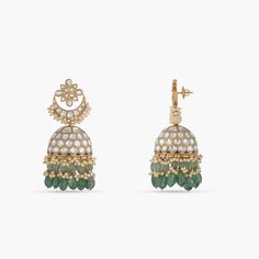 Description Floral motif meets the iconic Chaand in these gold plated silver Jhumki. Carved uncut polki stones close-set in Jadau style have been expertly encrusted, sitting pretty in their niches. From the jhumki hangs high quality pearls interspersed with semi-precious emeralds Product Information Metal: 925 Silver with 1.0 microns Gold Plating Length: 8 cm Stones: Semi precious stones Findings: Threaded post suitable for screw backs. Festive Yellow Gold Hand-set Chandbalis, Yellow Gold Kundan Chandbalis With Tilla Details, Yellow Gold Kundan Jhumkas With Cutdana, Bollywood Style Kundan Jhumkas In Yellow Gold, Ceremonial Kundan Chandbali Jhumkas, Temple Jewelry Style Meenakari Chandbalis For Reception, Ceremonial Meenakari Chandbali Jhumkas, Hand Set Kundan Jhumkas For Diwali, Yellow Gold Chandbali Jhumkas For Reception