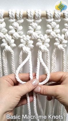 two hands are working on a white macrame knott with text overlay that reads basic macrame knots