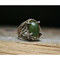 "A wonderful vintage Sterling Silver ring with green stone. The face of the ring measures approx. 3/4\" tall Size 6 Weight - 6 grams. Stamped Sterling. Great condition with vintage patina. Return We want you be happy with your purchase! Should that ever not be the case, we will gladly accept any return with a no questions asked policy. Return item in the condition they were received within 30 days for a full refund and initiate your return through the Etsy return center." Hand Cast Vintage Rings For Anniversary, Vintage Hand Cast Rings For Anniversary, Vintage Hand-cast Rings For Anniversary, Vintage Bronze Hand Cast Ring, Vintage Hand Cast Bronze Ring, Bohemian Green Rings For Anniversary, Antique Green Emerald Ring, Vintage Oval Hand-cast Jewelry, Vintage Gold Turquoise Ring