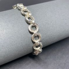 Silver Vortex Chainmaille Bracelet | Etsy Wire Bending, Diy Beading, Chainmail Bracelet, Chainmail Jewelry, Wire Wrapped Jewelry Diy, Bijoux Fil Aluminium, Lace Bracelet, Chainmaille Bracelet, Chain Maille Jewelry