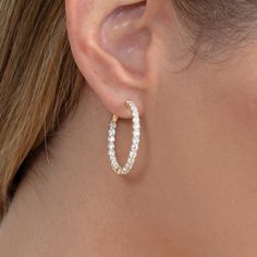 Carmen Add a touch of brilliance to your look with our Lab Grown Diamond Round Hoops. These stunning earrings feature lab-grown diamonds meticulously set in a classic round hoop design, offering exceptional sparkle and elegance. Crafted with care, these hoops combine sustainable luxury with timeless style. Perfect for any occasion, they effortlessly elevate both casual and formal outfits. Make a statement with these exquisite diamond hoops, a must-have addition to any jewelry collection. - Handm