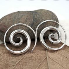 Handmade Sterling Silver Medium Size Simple Rustic Thick Spiral Tribal Earrings For Women Or Men Size: 7/8 Inches / 2.2cm - The Thinner Part Is Of The Spiral Is About 1mm (A Normal Earring's Hook) Metal Purity: 95-98% Silver. (Purer Than 925 Sterling Silver) Fake Gauge Earrings, Red Earrings Stud, Handmade Silver Jewellery, Silver Statement Earrings, Spiral Earrings, Men Earrings, Simple Earrings, Ethnic Jewelry, Etsy Jewelry