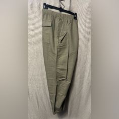 Brand New Lightweight Linen Cargo Green Joggers From Gap With Elastic Waist And Tie Gap Utility Bottoms With Side Pockets, Gap Bottoms With Side Pockets For Spring, Gap Spring Cargo Pants With Pockets, Casual Gap Cargo Pants, Gap Bottoms With Pockets For Spring, Gap Bottoms For Spring, Casual Gap Cargo Pants With Side Pockets, Summer Khaki Tapered Leg Cargo Pants, Spring Gap Bottoms With Pockets