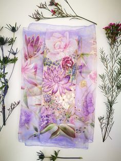 Elegant Hand painted luxury silk chiffon scarf 'Rustic Lavender'. Design was whispered by one client Lady and so was custom created Big wedding bouquet in the center and lots of messy flowers falling around. You can find here natural looking flowers like: Dahlia, Spray Roses, Laucodendro, Seruria, Scabiosa, Astranzia, Sedum , Alium, Brunia, Ornitogallo, Wax flowers and lots of violet Veronica which connects lavender background with whole flora. Very Wide but well matched color palette-lavender b Elegant Purple Silk Scarf For Wedding, Purple Silk Scarves With Floral Print, Purple Silk Scarf For Summer Gift, Summer Purple Silk Scarf As A Gift, Summer Gift Purple Silk Scarf, Silk Scarf With Floral Print For Wedding, Purple Bohemian Scarves With Floral Print, Purple Bohemian Silk Scarf As Gift, Artistic Purple Silk Scarves