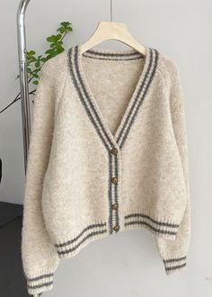 Expertly crafted with a relaxed fit and a button-down front, our V-neck striped cardigan is the perfect addition to your cozy wardrobe. Featuring striped trim along the edges, this cardigan adds a touch of laid-back style to any outfit. Stay cozy and comfortable while looking effortlessly chic. Old Navy Cardigan, Cozy Wardrobe, Button Up Cardigan, Beige Cardigan, Striped Cardigan, Laid Back Style, Stay Cozy, Cute Outfits, Relaxed Fit