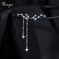 Brand: Thaya  Pattern: Stars/ love  Gender: Female  Time to market: 2022 Silver Jewelry Stars, Celestial Wedding Jewelry, Silver Star Jewelry, Constellation Accessories, Madrigal Dinner, Cosmos Earrings, Constellation Piercing, Dipper Constellation, Space Earrings