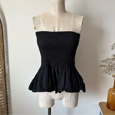 Condition: Brand New With Tag! In Excellent Condition! 100% Cotton Approx. Measurements: Pit To Pit: 11", Length: 15" Just Selling (No Trades & Lowball Offers Please) Black Summer Top With Elastic Waistband, Casual Smocked Top With Ruffle Hem For Day Out, Black Sleeveless Top With Smocked Back, Sleeveless Black Smocked Top, Black Sleeveless Smocked Top, Black Sleeveless Smocked Top With Ruched Detail, Black Sleeveless Smocked Top For Day Out, Black Sleeveless Ruched Smocked Top, Black Sleeveless Smocked Ruched Top