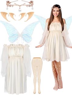 a girl in a white dress and butterfly wings