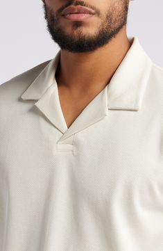 A notched, open collar furthers the everyday comfort of a polo made of breathable cotton and styled to relax any favorite look. Johnny collar Short sleeves 100% cotton Machine wash, dry flat Imported Relaxed Fit Cotton Polo Sweater With Collar, Cotton Polo Sweater With Collared Neckline, Cotton Golf Tops With Collared Neckline, Classic Camp Shirt With Collared Neckline, Cotton Camp Shirt With Collared Neckline, Relaxed Fit Cotton Collared Polo Sweater, Cotton V-neck Polo Shirt With Relaxed Fit, Relaxed Fit Cotton V-neck Polo Shirt, Classic V-neck Cotton Polo Sweater