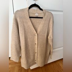 Cozy Oversized Cardigan In A Cream Color. New Without Tags, Never Worn. Cozy Button-up Sweater For Loungewear, Cozy Button-up Sweater Coat, Cozy Soft Knit Daywear Sweater, Comfy Everyday Cardigan, Comfy Everyday Winter Cardigan, Cozy Button-up Cardigan For Daywear, Oversized Cardigan, A New Day, Cream Color