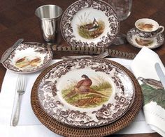 an image of a table setting with plates and silverware on the placemats