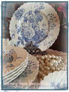 blue and white plates stacked on top of each other