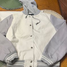 Nwt Ladies Leather Jacket Size Large With Attached Good White And Grey White Hooded Varsity Jacket For Fall, White Varsity Jacket With Pockets For Winter, White Varsity Jacket With Pockets For Fall, Casual White Varsity Jacket With Pockets, Casual White Varsity Jacket For Winter, Casual White Varsity Jacket For Fall, Trendy White Varsity Jacket For Spring, Sporty White Varsity Jacket With Pockets, Casual White Varsity Jacket For Spring