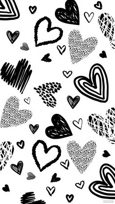 black and white hearts drawn on paper