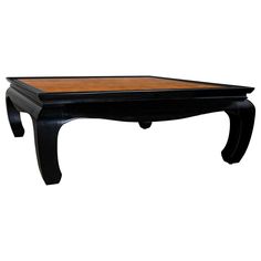 a black coffee table with wooden top and legs on white background, viewed from the side