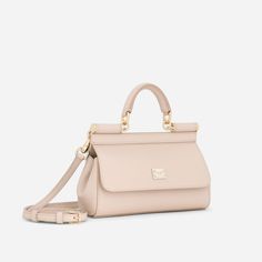 A brand icon, the practical and compact Sicily Small Handbag in Pink is perfect for carrying your essentials with you. Coming in Dauphine calfskin, it features an adjustable, detachable crossbody strap and is embellished by a logo tag with two metal plating finishes. Everyday Luxury Top Handle Bag With Detachable Strap, Luxury Everyday Bag With Adjustable Handle, Luxury Leather Bag With Adjustable Handle, Luxury Shoulder Bag With Adjustable Handle For Travel, Luxury Bags With Adjustable Handle, Luxury Bags With Double Adjustable Handle, Luxury Handheld Bags With Adjustable Strap, Luxury Handheld Bag With Adjustable Strap, Designer Leather Satchel With Adjustable Handle