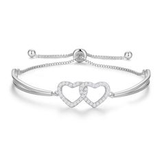 PRICES MAY VARY. Heart Bracelet for Women: MADE WITH LOVE. Design cubiz zirconia double heart in the middle of the bracelet, make it look more pretty. Measures up to 9.5 inches in Length. Silver Bracelets for Women: Made of S925 Sterling silver, and the double heart is set with 5A cubic zirconia, this womens sterling silver heart bracelet is nickel-free, lead-free. You can wear it in daily life and no worry about sensitive skin. Gifts for Her: Fashion and elegant silver bracelets are suitable fo Silver Cross Bracelet, Sterling Silver Heart Bracelet, Silver Heart Bracelet, Bolo Bracelet, Silver Bracelets For Women, Birthday Gifts For Teens, Infinity Heart, Sterling Bracelets, Hand Bracelet