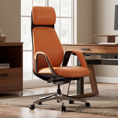 an orange office chair sits in front of a desk with a computer monitor on it