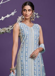 Light Steel Blue Designer Embroidered Party Wear Lucknowi Pant Suit-Saira's Boutique Blue Straight Kurta Set For Reception, Blue Pant Set With Resham Embroidery, Traditional Blue Pant Set With Floral Embroidery, Elegant Blue Pant Set With Resham Embroidery, Sleeveless Blue Sets For Reception, Blue Sleeveless Set For Reception, Blue Sleeveless Sets For Reception, Designer Embroidered Light Blue Sets, Bollywood Blue Sleeveless Sets