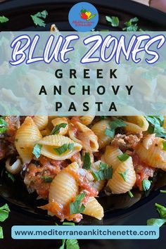 a black plate topped with pasta covered in sauce and parsley next to the words blue zones greek anchovy pasta