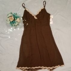 Brown Silk Spaghetti Strap Dress With Tan Lace Edging On Top And Bottom. Nwt. Just Haven't Had A Chance To Wear It. Brown Slip Dress With Spaghetti Straps, Brown Mini Dress With Spaghetti Straps For Beach, Brown Spaghetti Strap Mini Dress For The Beach, Brown Spaghetti Strap Mini Dress For Beach, Brown Sleeveless Slip Dress For Summer, Spring Brown Fitted Slip Dress, Fitted Brown Slip Dress For Spring, Brown Sleeveless Slip Dress For Spring, Sleeveless Brown Slip Dress For Spring