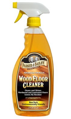 a bottle of wood floor cleaner on a white background