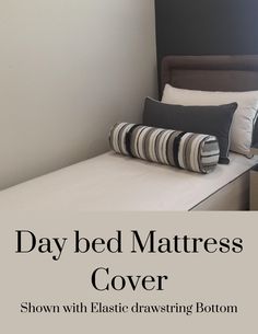 day bed mattress cover shown with black and white striped pillows on the bottom, along with text overlay reading day bed mattress cover