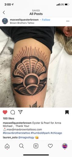 a woman's leg with a sun tattoo on it and an instagramt