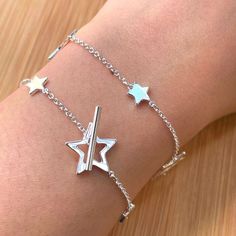 Star Bracelet Silver, Sterling Silver Toggle Bracelet, Celestial Bracelet, Friendship Bracelet, Bridal Bracelet, Bridesmaid Bracelet, Gift No one can resist this piece of sparkling stars lariat bracelet! Presented with big and tiny stars all along the bracelet, it definitely catches a lot of attention on your wrist! The lariat design makes the bracelet very adjustable and fit. Find the matching anklet following this link: https://www.etsy.com/listing/224186639/925-sterling-silver-shining-stars-a Bracelet Station, Celestial Bracelet, Silver Star Bracelet, Silver Market, Bridesmaid Bracelet Gift, Gold Claddagh Ring, Star Anklet, Station Bracelet, Special Style