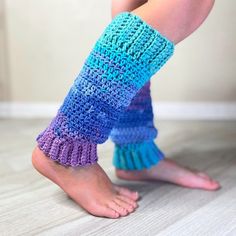 a woman's legs wearing crocheted leg warmers