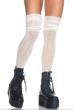 You'll love the amazing crochet pattern and the adorable scrunched look in these unique stockings. Pair this with boots for an outfit that's feminine, soft, and irresistible. Fitted Mid-calf Stockings For Fall, Crochet Stretch Leg Warmers, Winter Lace Fitted Legwear, Fitted Thigh-high Knitted Stockings, Fitted Knitted Thigh-high Stockings, Thigh High Cable Knit Socks For Stocking Stuffer, Thigh-high Cable Knit Socks For Stocking Stuffers, Cozy Fitted Crochet Leg Warmers, One Size Knit Knee-high Socks