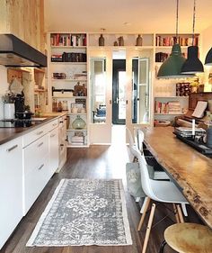 the kitchen is clean and ready to be used as a dining room or living area