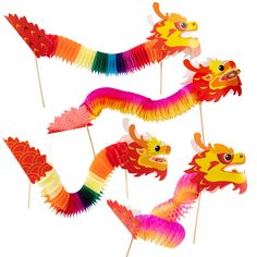 colorful dragon lollipops are on sticks