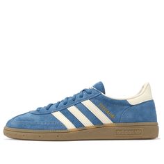 The adidas Handball Spezial Shoes are a revival of a classic design. Originally released in the '70s as indoor sports shoes, they’ve stood the test of time. These unisex sneakers feature a synthetic upper and a textile lining, ensuring a lightweight and breathable construction. The rubber outsole provides essential tra Colorful Shoes Outfit, Spezial Shoes, Urban Sneakers, Adidas Handball Spezial, Adidas Handball, Preppy Shoes, Ugly Shoes, Adidas Spezial, Indoor Sports