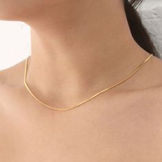 Gold Box Chain Necklace - This listing is for Box Chain Necklace only, dainty and perfect for layering - Length: 18" + 2" Extender - Measurement: 1mm - Base Material: High Quality .925 Sterling Silver - Finish: 18K Gold - Nickel Free - All our jewelry is packaged in gift ready boxes. If you would like multiple items from your order packaged separately please let us know! © 2023 Generation of Daughters Rectangular Curb Chain Necklaces For Gift, Gold Snake Chain Necklace Gift, Dainty Curb Chain Necklace Gift, Rectangular Delicate Chain Necklace Gift, Dainty Chain Necklace With Box Chain For Gift, Rectangular Delicate Chain Necklace For Gift, Dainty Box Chain Necklace As A Gift, Dainty Box Chain Necklace For Gift, Gift Rectangular Delicate Chain Necklace