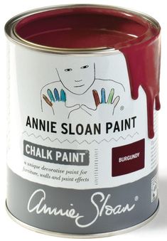 a red paint can with the words annie sloan paint on it's bottom half