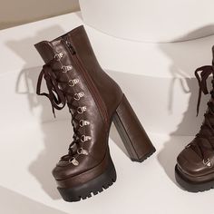 Looking for the perfect pair of boots to add a touch of edge to your outfit? Look no further than our brown platform boots! These lace-up beauties are made with high-quality materials and feature a 5.5'' block heel that will give you a boost of height without sacrificing comfort.Whether you're wearing them with jeans and a tee or a cute dress. these boots are sure to add an element of cool to your look. Plus. they're versatile enough to take you from day to night with ease. So don't wait ââ‚?gra Brown Platform Boots, Brown High Heel Boots, Brown High Heels, Zipper Heels, Outfit Look, Chunky Boots, Leather Shorts, Peep Toe Heels, Cute Dress